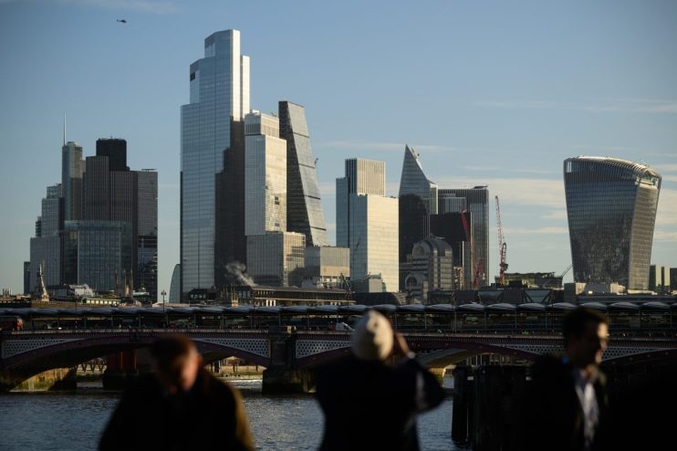GettyImages 2244121938 displaying a professional business meeting with diverse executives discussing strategic plans in a ...