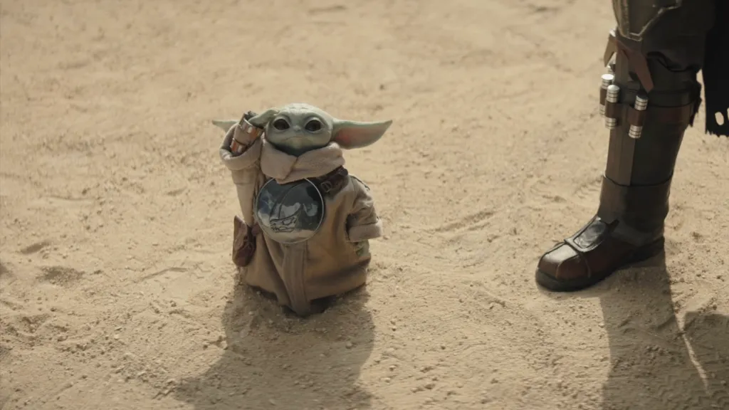 Grogu saluting in The Mandalorian and Grogu