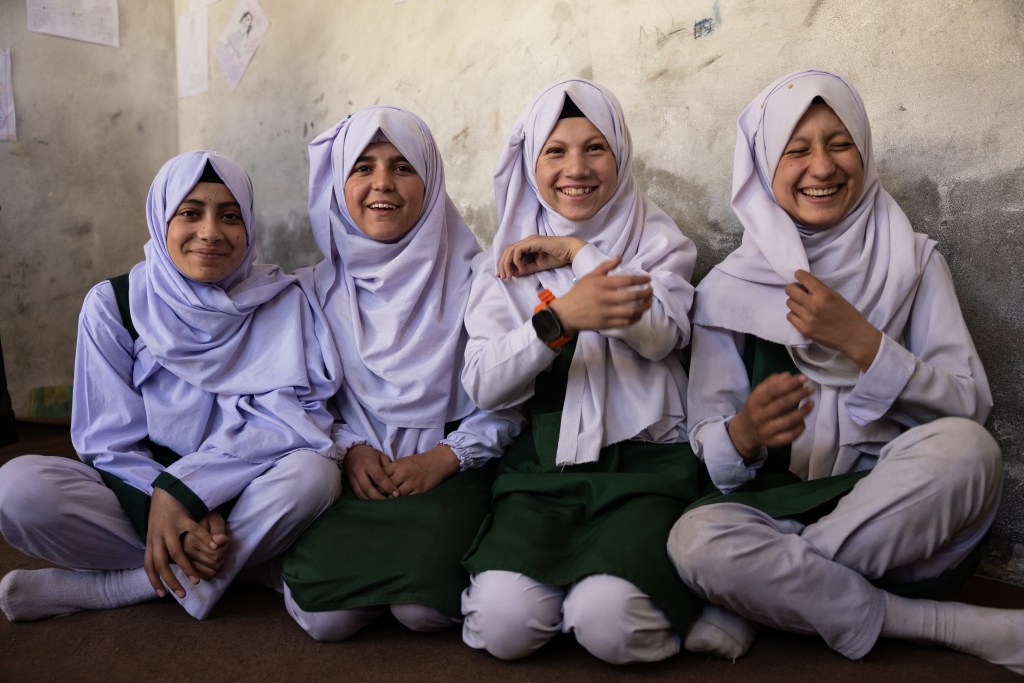 Girls smiling in Pakistan.