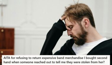 stressed man in black sweater