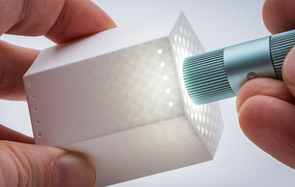 3D printed monolithic zirconia gyroid fuel cell architecture. Photo via Lithoz.