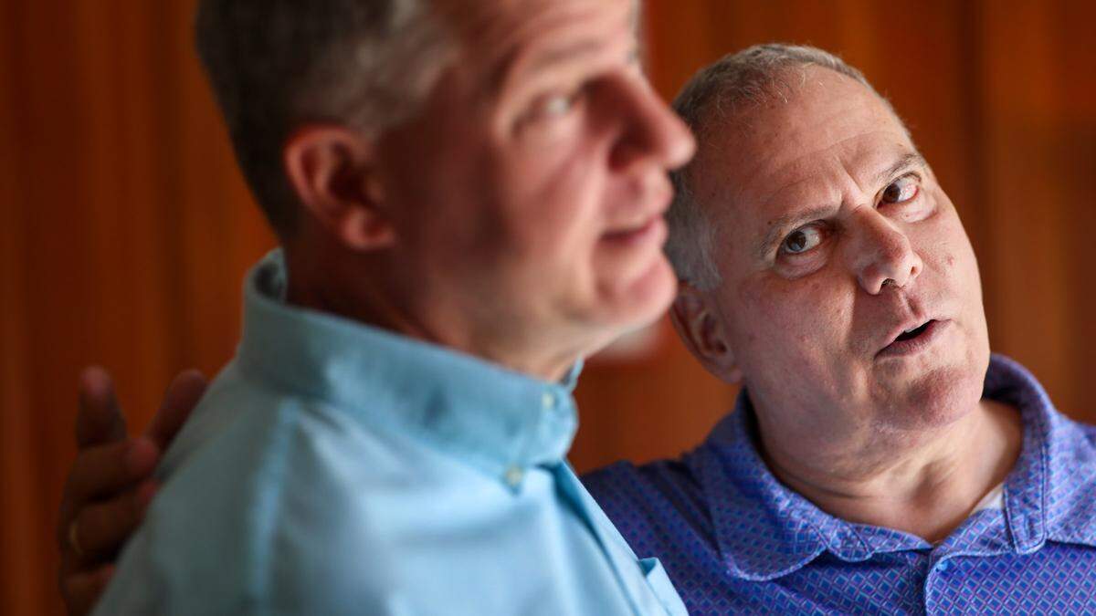Timothy Sick, 66, recovering from Parkinson's disease symptoms after undergoing high-frequency focused ultrasound treatment at Baptist Hospital, is grateful for with his partner of over 20 years, Sal Zambito, 59, as they prepare to leave for Buffalo, N.Y., in Fort Lauderdale, Fla., Tuesday, April 28, 2026. Sick says the procedure has allowed him to enjoy life again.