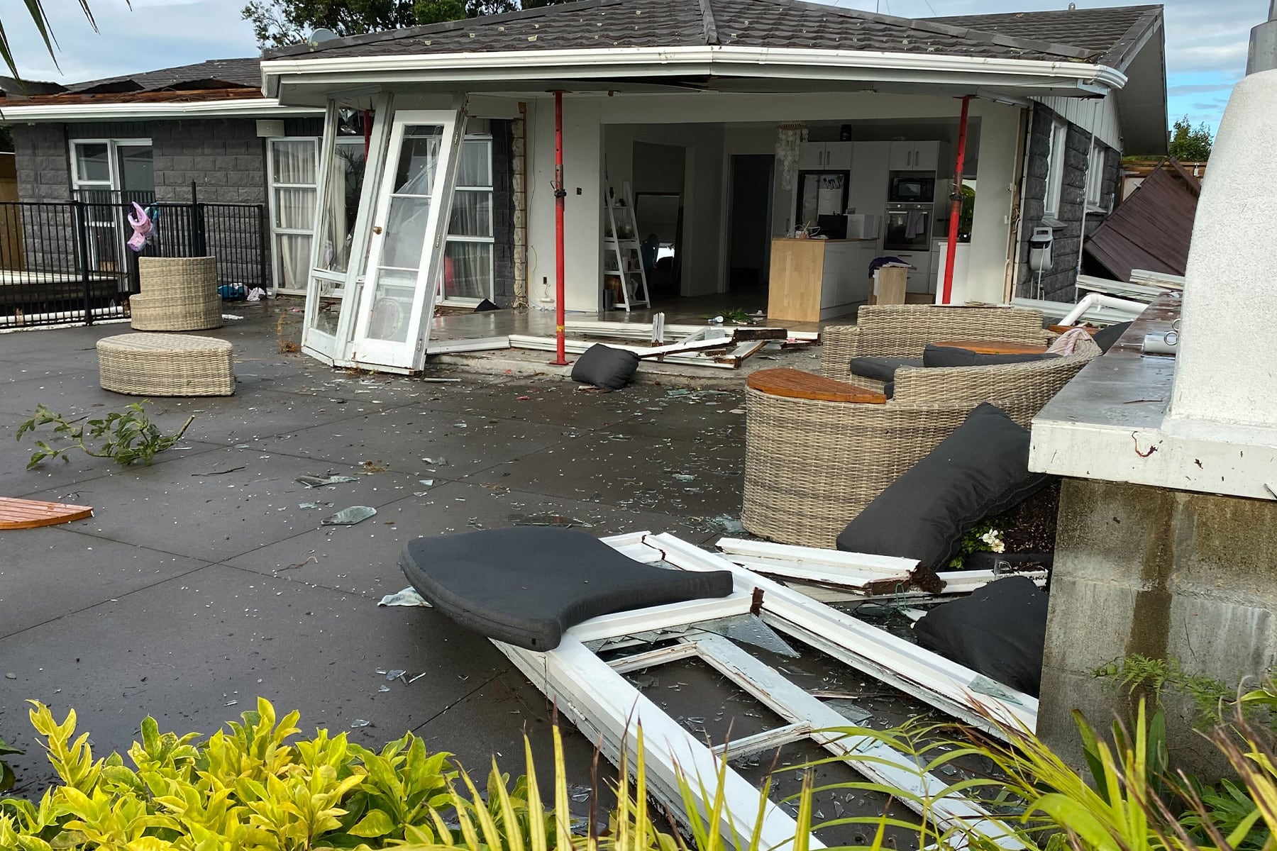 The remains of Hotu Frew's sunroom after winds described as a 'tornado' ripped through Maungatapu. Photo / Rosalie Liddle Crawford