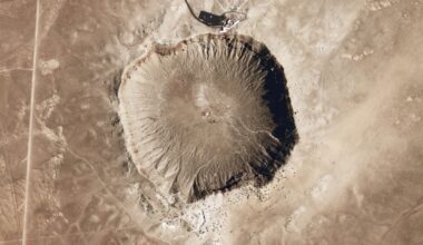 The Meteor Crater or Barringer Crater in Arizona is only about 50,000 years old and is the most well-preserved crater on Earth. Ancient craters like the Zhamanshin crater in Kazakhstan are far less well-preserved, and measuring its actual size is challenging becuase it was created almost one million years ago. New research shows that the Zhamanshin crater could be twice as large as thought, and far more destructive. Image Credit: By National Map Seamless Server - NASA Earth Observatory, Public Domain, https://commons.wikimedia.org/w/index.php?curid=7549781
