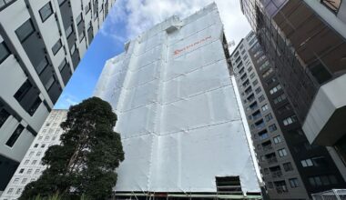 Leaky 17-level 129-unit Cintra apartment/hotel block fixed