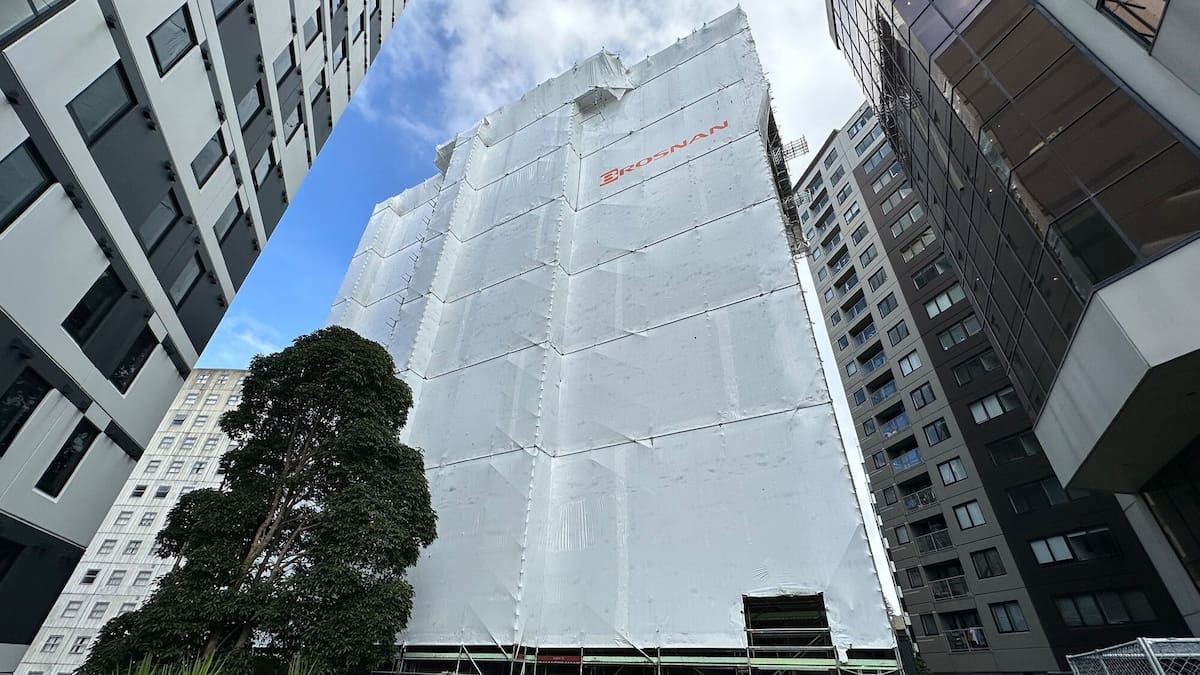 Leaky 17-level 129-unit Cintra apartment/hotel block fixed