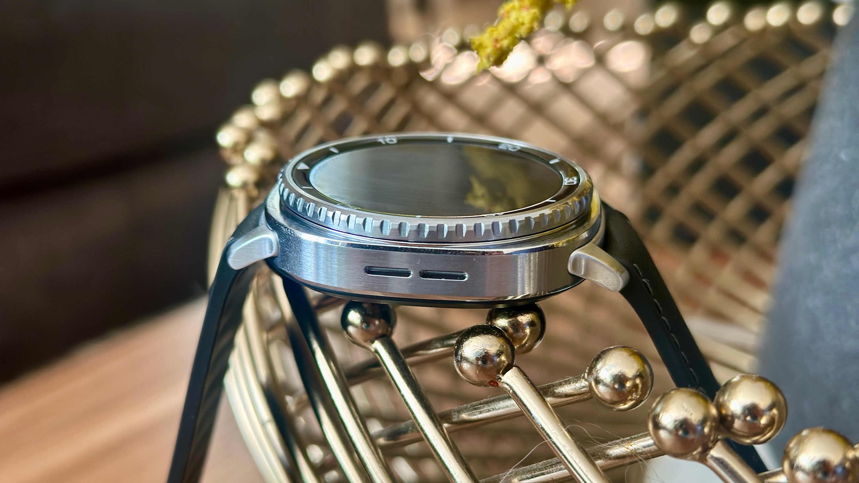 A close-up of the Samsung Galaxy Watch 8 Classic on the left side.