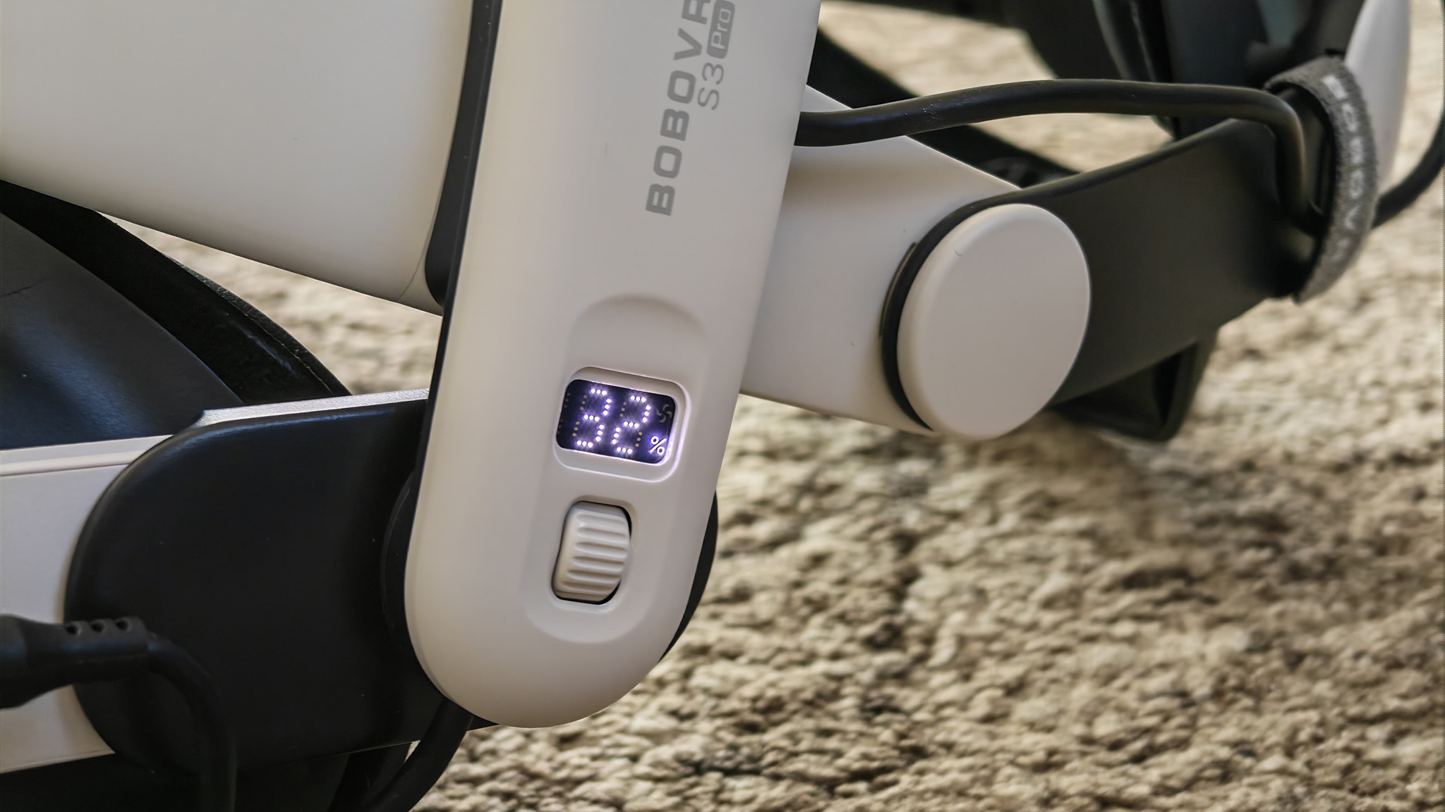 The battery indicator on a BoboVR S3 Pro installed on a Meta Quest 3 headset