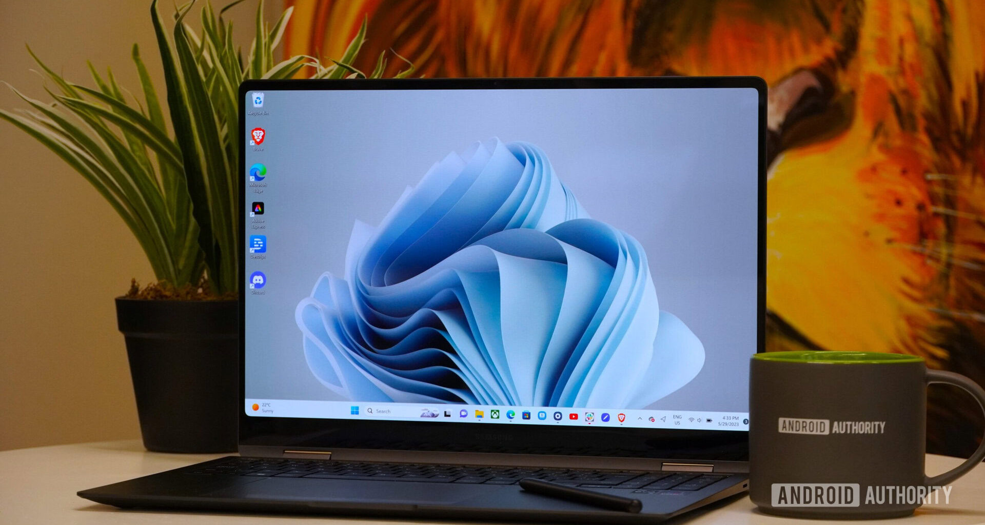 Samsung Galaxy Book 3 Pro 360 with plant and coffe mug