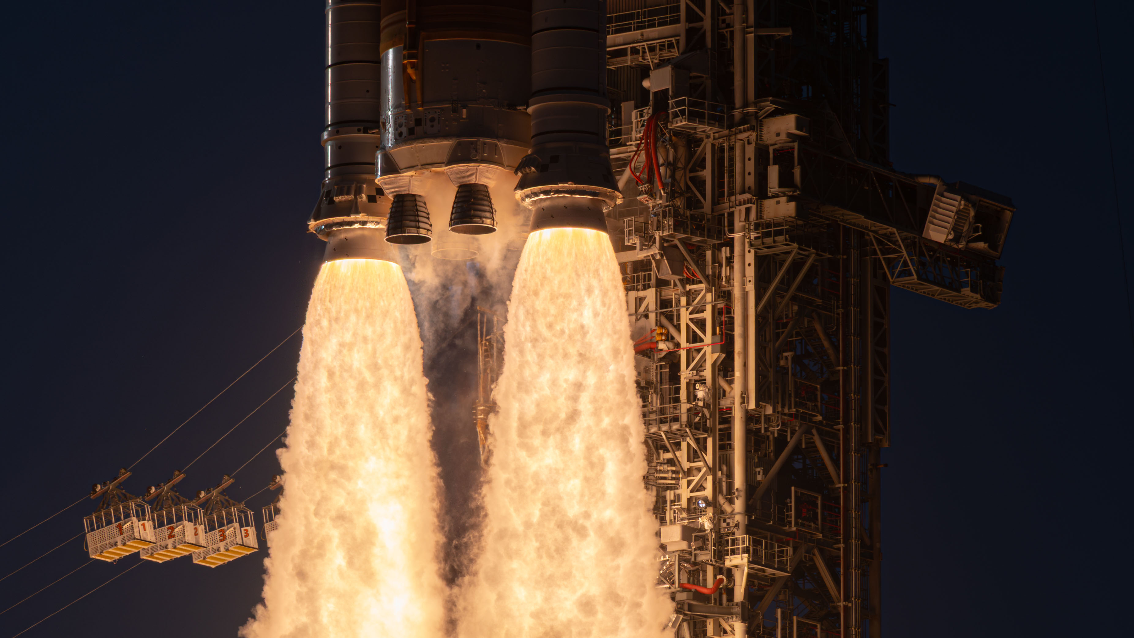 NASA’s Space Launch System (SLS) rocket and Orion spacecraft launch on the Artemis II test flight, Wednesday, Apr. 1, 2026, from Launch Complex 39B at NASA’s Kennedy Space Center in Florida. Commander Reid Wiseman, Pilot Victor Glover, and Mission Specialist Christina Koch from NASA, and Mission Specialist Jeremy Hansen from the CSA (Canadian Space Agency), will fly around the Moon and back to Earth during their approximately 10-day mission. Liftoff from Launch Complex 39B occurred at 6:35 p.m. EDT. Photo Credit: (NASA/John Kraus)