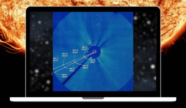 A laptop displays an image of the sun's atmosphere with the sun in the background.