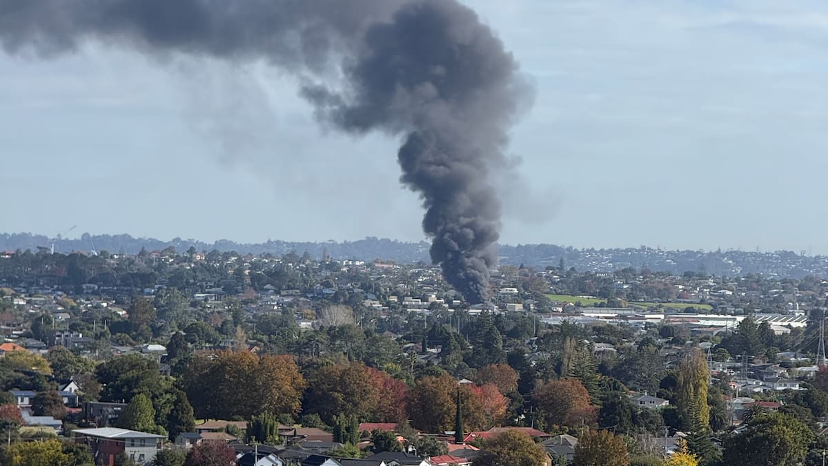 Glendene building fire sends black smoke over West Auckland, 14 fire crews race to scene