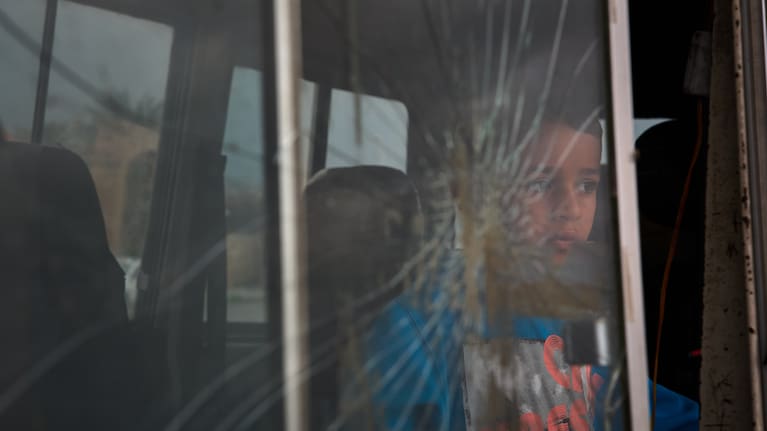 A boy who fled with his family following Israeli strikes in southern Lebanon.