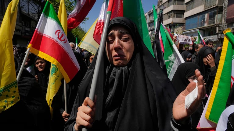 A government supporter weeps during a mourning ceremony marking the 40th day since the death of Iranian Supreme Leader Ayatollah Ali Khamenei.