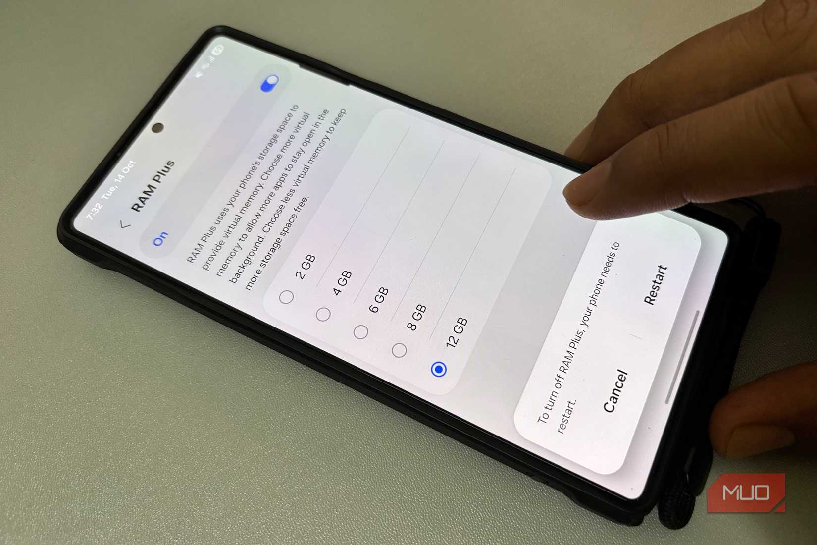 A person adjusting RAM Plus settings on a Samsung phone