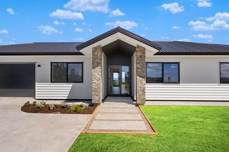 A four-bedroom character home is up for grabs at 306 West Coast Road, in Makarau. Photo / Supplied