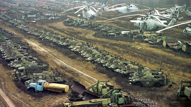 About 1350 Soviet military helicopters, buses, bulldozers, tankers, transporters, fire engines and ambulances, all highly contaminated with radiation, sit abandoned in a junkyard, in Chernobyl, Ukraine, Nov. 10, 2000.