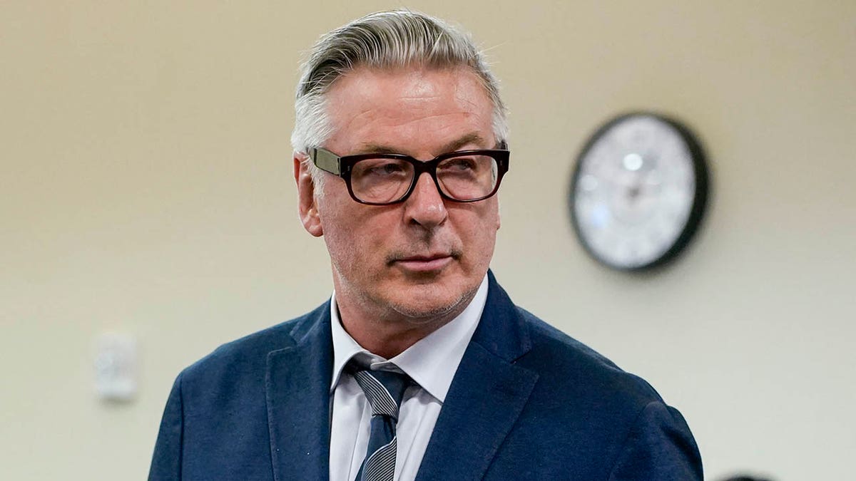 Alec Baldwin standing in a courtroom in Santa Fe, New Mexico