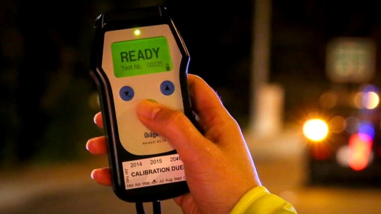 A breath test device ready for use.