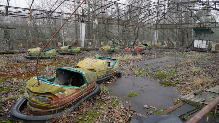 Bumper cars sit in a playground in the deserted town of Pripyat, Ukraine, Nov. 27, 2012.
