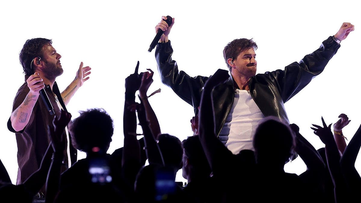 The Chainsmokers performing on stage at Lucas Oil Stadium in Indianapolis