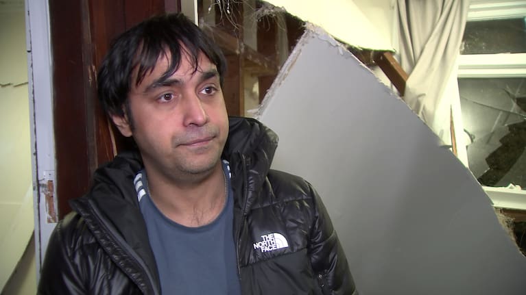 CJ Kochar at his damaged Brooklyn flat 