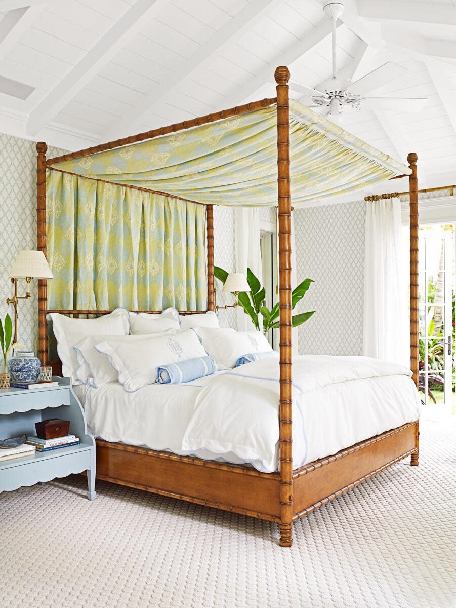 A cozy bedroom featuring a four-poster bed.