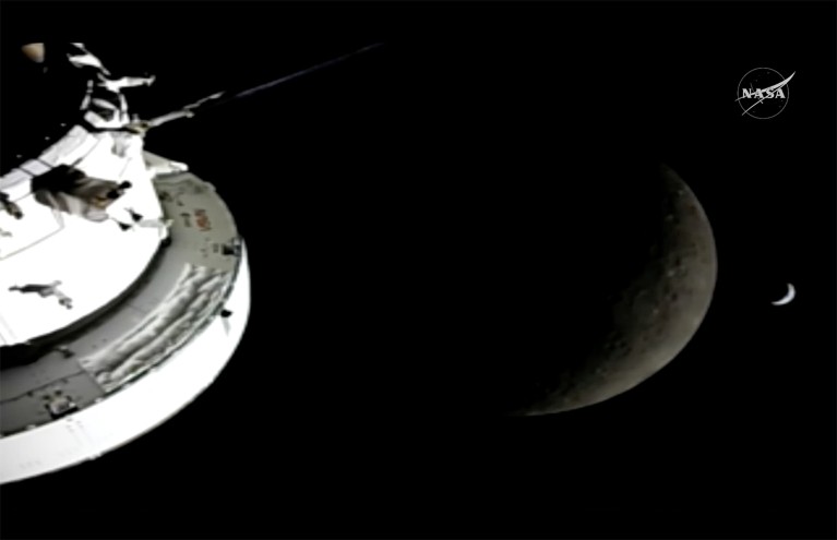 The Orion capsule in the foreground, the Moon in the middle, and a crescent siiver of the Earth in the background.