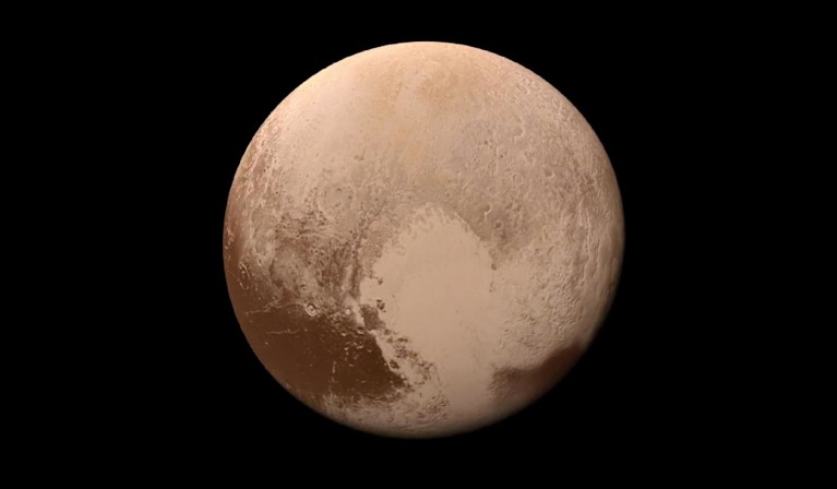 A clear view of Pluto with surface texture visible taken from the New Horizons spacecraft.