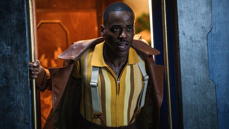 The Doctor (Ncuti Gatwa) rides a train in Doctor Who