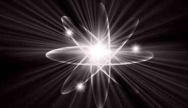Trapped particle inside an atom may reveal clues about mass
