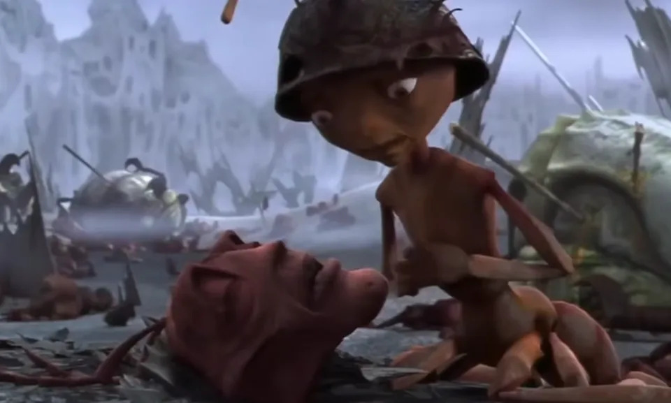 Animated ant, resembling a soldier, appears emotional on a battlefield filled with debris
