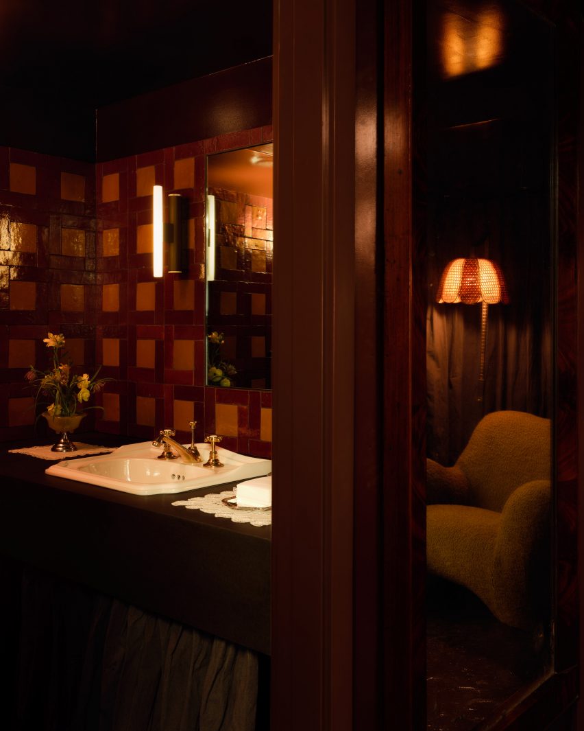 Low-lit orangey bathroom