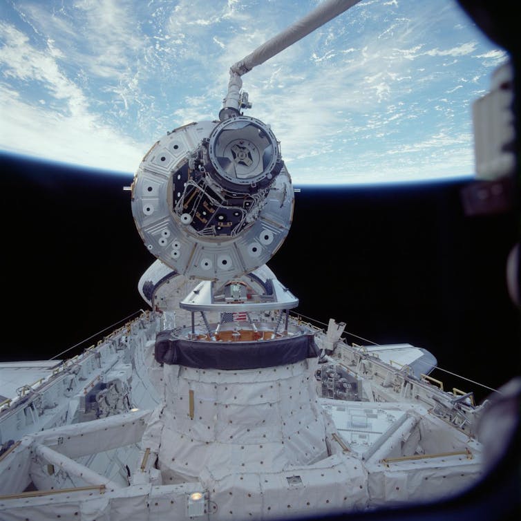 Two modules of the space station connecting.