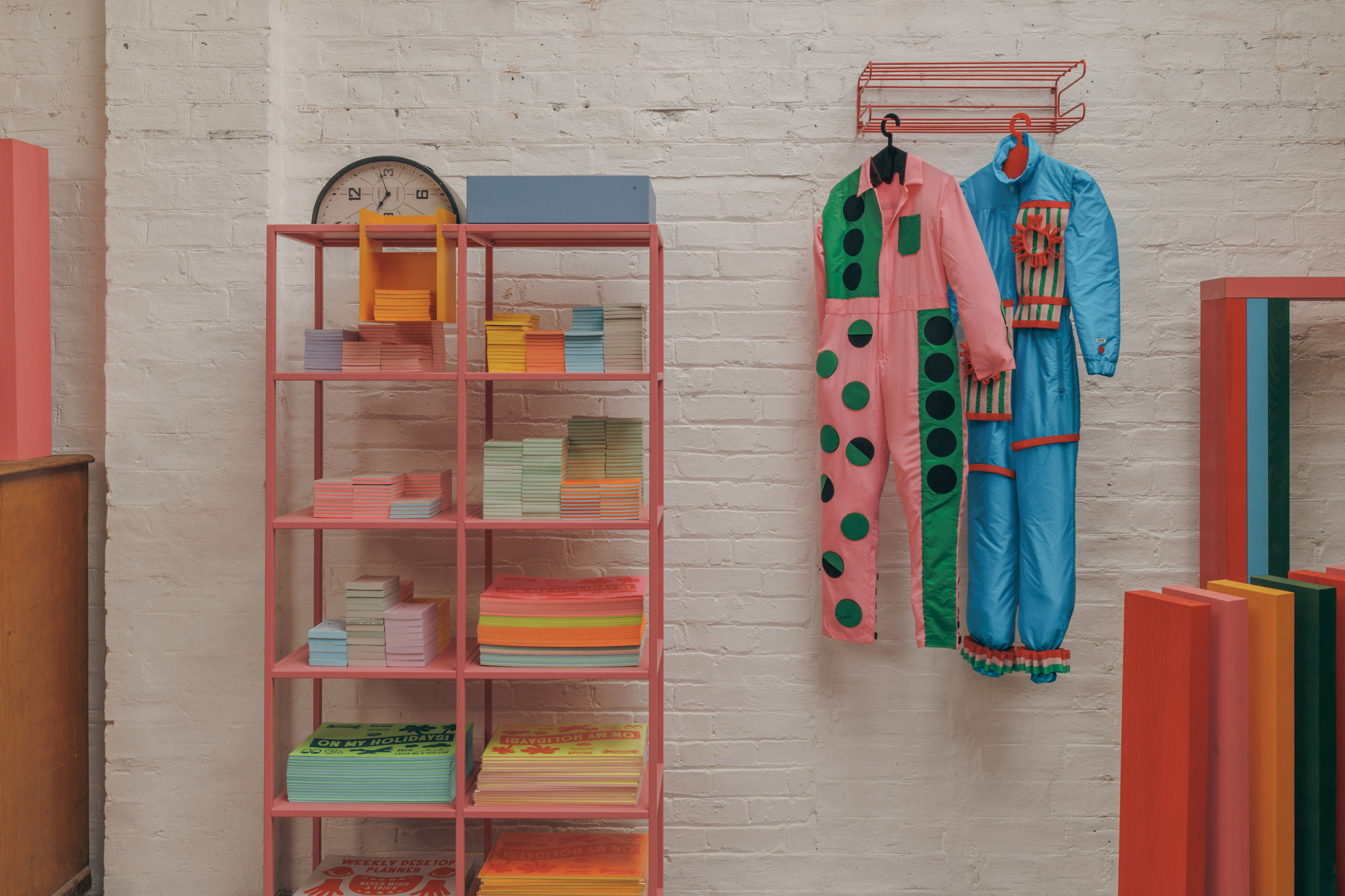 Colourful shelving in the printing studio