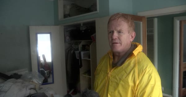 Woman, 87, lifted into cupboard to escape floodwaters in home