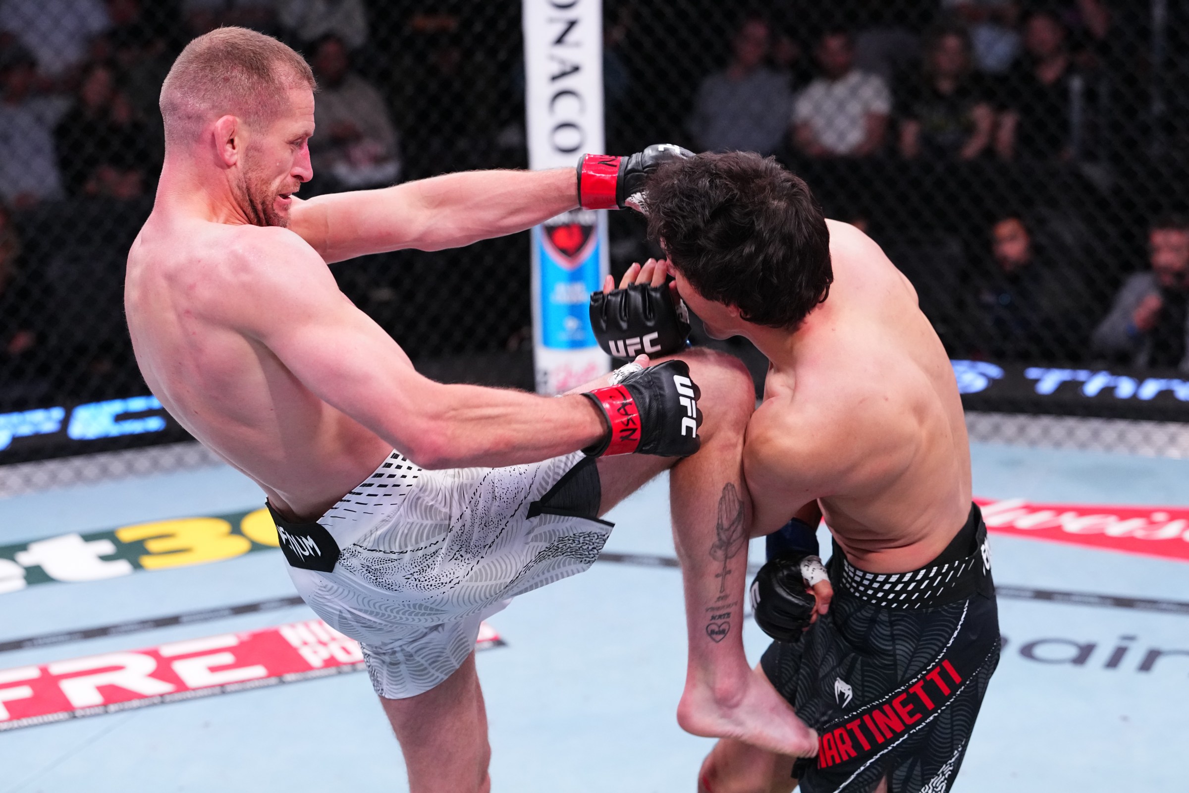 LAS VEGAS, NEVADA - APRIL 25: (L-R) Davey Grant of England knees Adrian Luna Martinetti of Ecuador in a bantamweight fight during the UFC Fight Night event at Meta APEX on April 25, 2026 in Las Vegas, Nevada. (Photo by Jeff Bottari/Zuffa LLC)