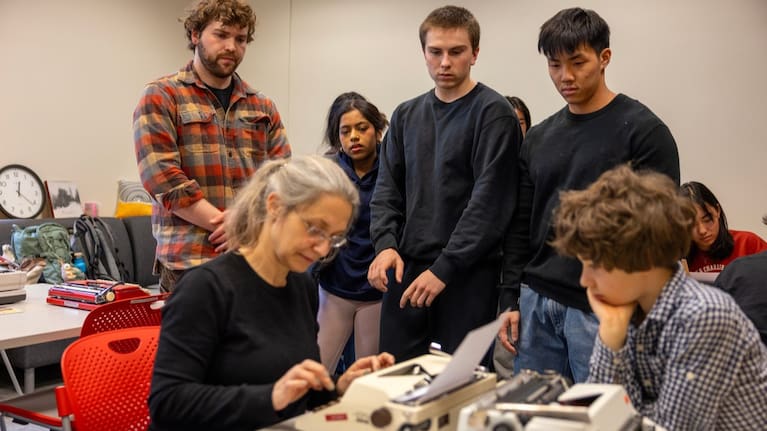 Grit Matthias Phelps gives students a demonstration on how to use a typewriter before class at Cornell University, Friday, March 20, 2026, in Ithaca, New York.