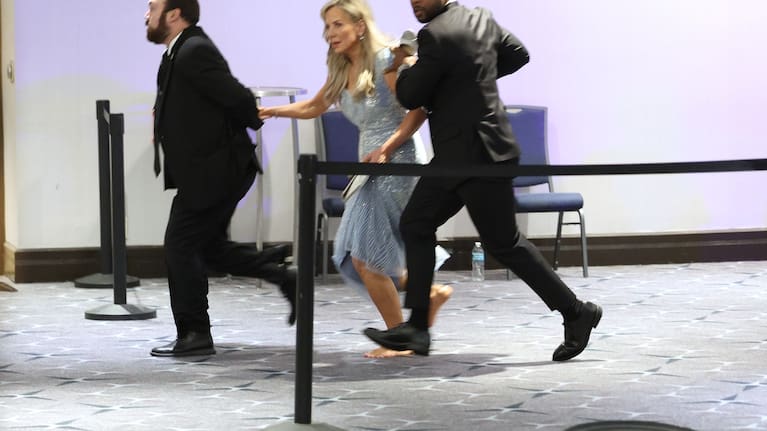 Guests are assisted and whisked away during the White House Correspondents Dinner.