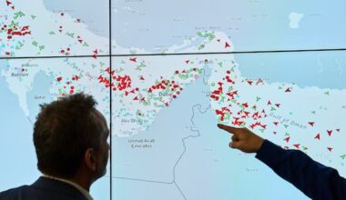 Iran reopens Strait of Hormuz, Trump says US blockade will remain