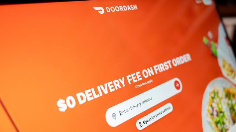 A screen displaying a DoorDash deal for zero delivery fee