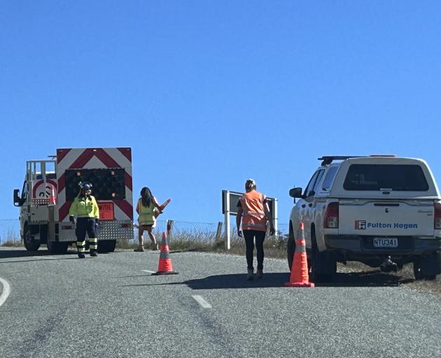 Emergency services at the crash site yesterday. Photo: Julie Asher