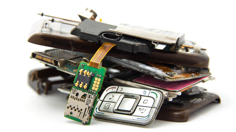 A dismantled phone on a white background