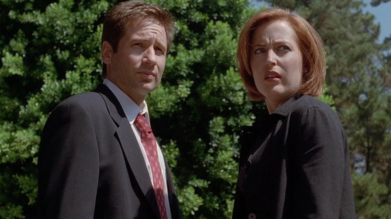 Agents Mulder and Scully looking suspiciously