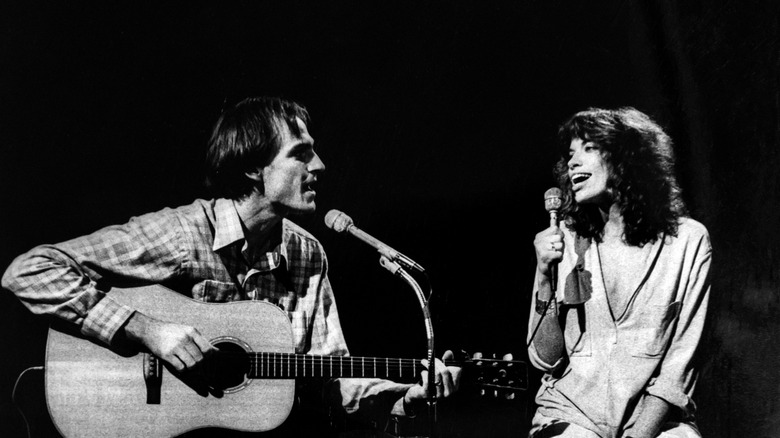 James Taylor and Carly Simon singing onstage