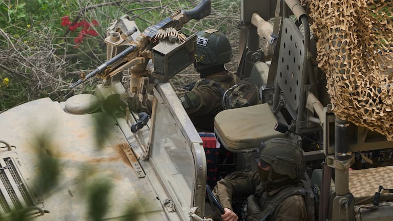 Israeli soldiers drive towards southern Lebanon from northern Israel, Wednesday, April 15, 2026.