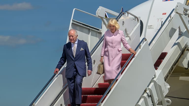 King Charles III, left, and Queen Camilla arrive at Joint Base Andrews.