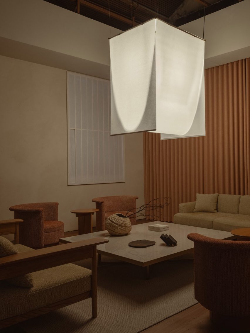 Room in earth colours with paper lamp