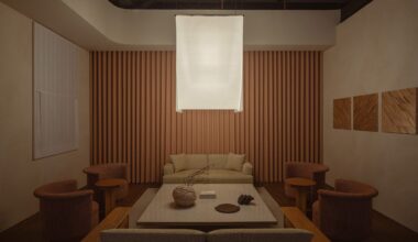 Washi-paper lamp above grey table