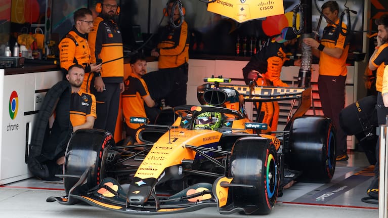 McLaren driver Lando Norris of Britain sits in a car during the qualifying session of the Japanese Formula One Grand Prix at the Suzuka Circuit in Suzuka, Japan.